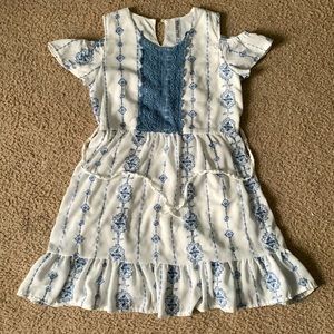 A dress used a couple time for formal events for kids